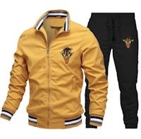 a yellow jacket and joggers set with a black hoodie